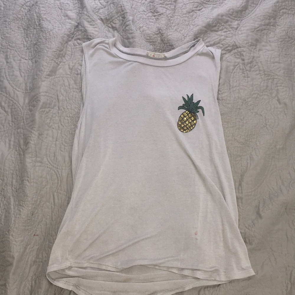 a tank top with a pineapple on it